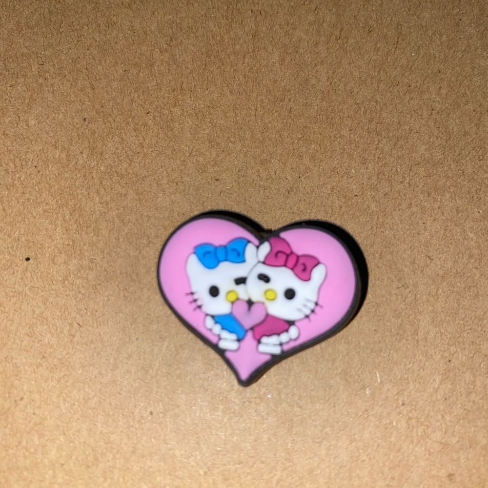 π6/$12π Hello Kitty Heart-Shaped Croc Charm